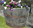 Flat backed barrel planters to go against a wall